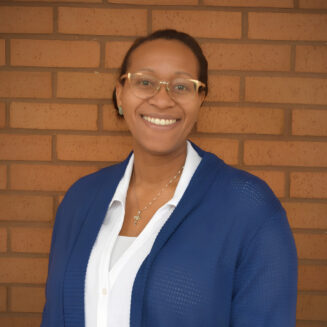 Professional headshot of Jenna Hayes